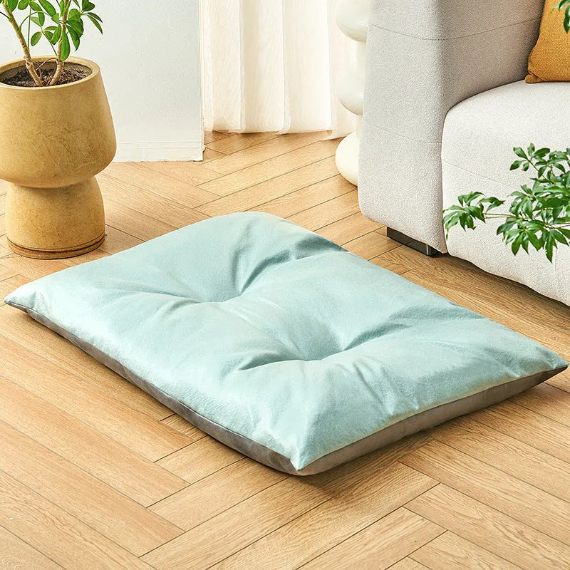 Blue and Coffee coloured pet sleeping mats shown in four different sizes for cats and dogs