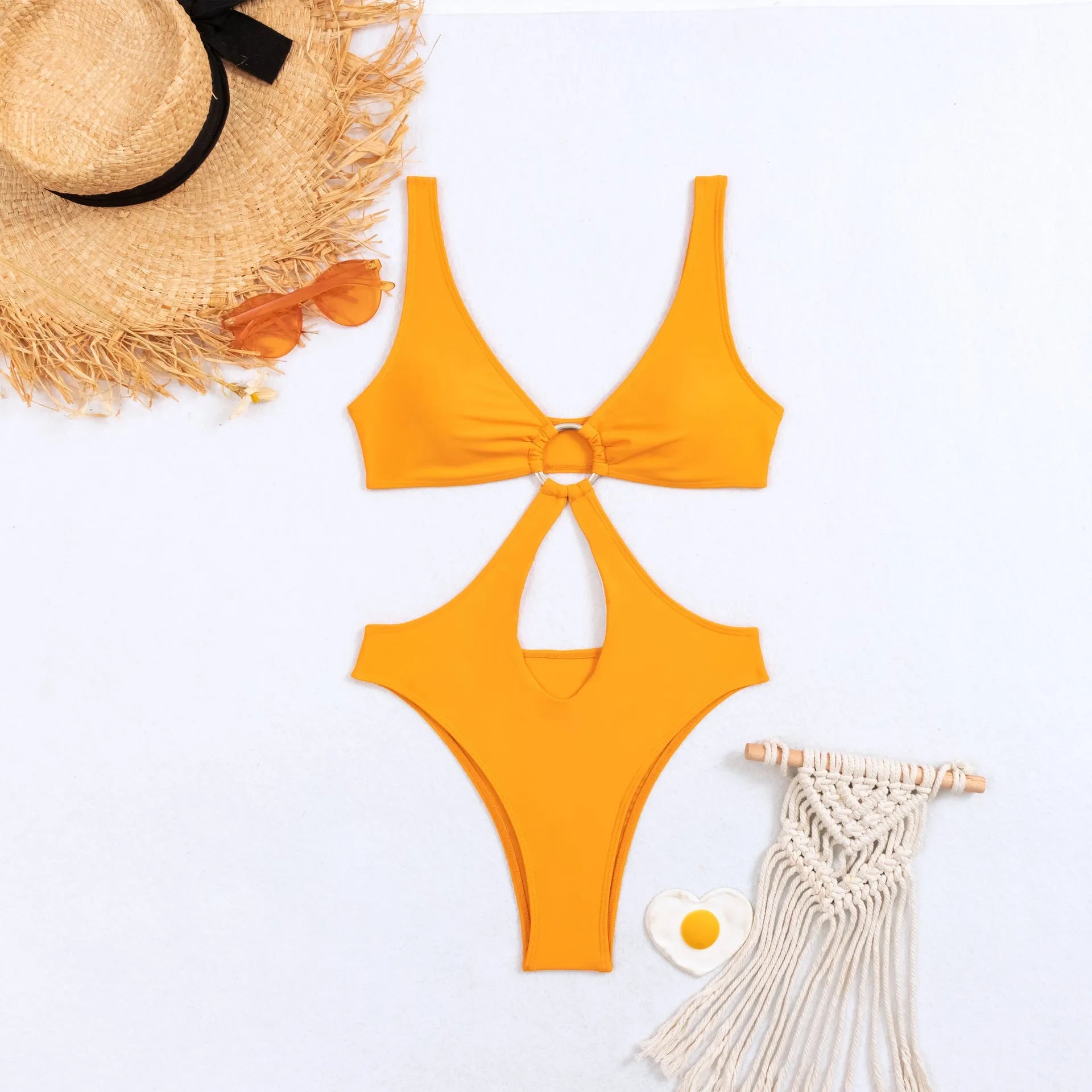 Black women's sleeveless one-piece swimsuit with triangle neckline on a mannequin