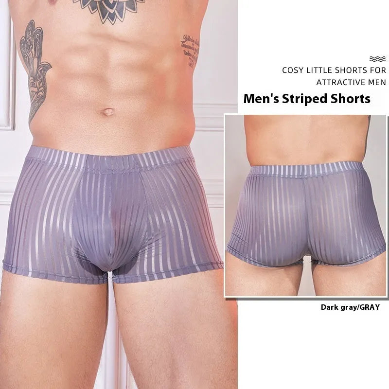 Men's thin striped nylon underwear in black, dark grey and white colours laid flat.