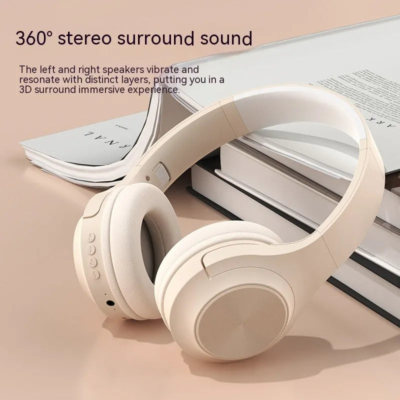 Creative head-mounted wireless Bluetooth headset in Ivory White colour on a charging bin.