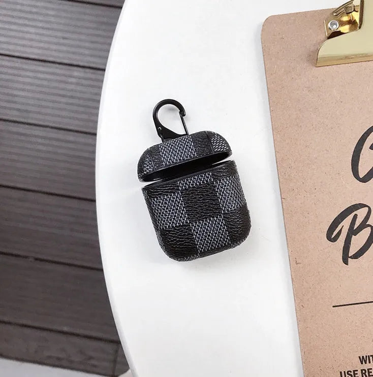 iPhone XS Max plastic hard shell case with anti-lost hook for a wireless headset, in a lattice grid pattern.