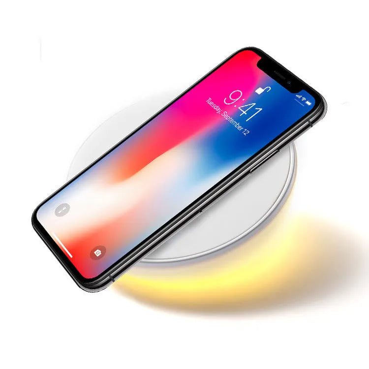 White 10W wireless charging pad with digital clock display and alarm functions