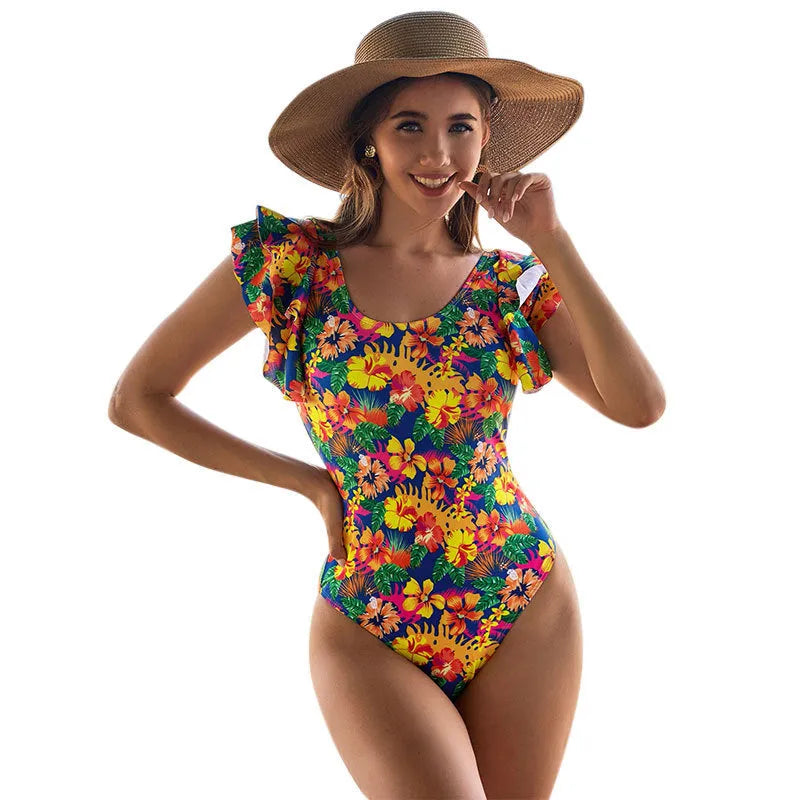 Women's one-piece swimsuit with U-shaped neckline and lace detailing on polyester fabric