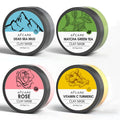 Set of four clay face mask jars: Dead Sea Mud, Green Tea, Turmeric, and Rose, each 80ml.