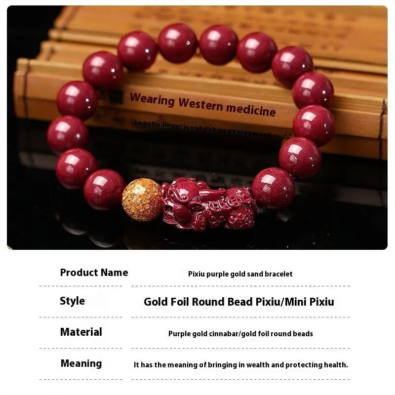 Purple gold sandstone cinnabar bracelet with totem elements on a wrist.