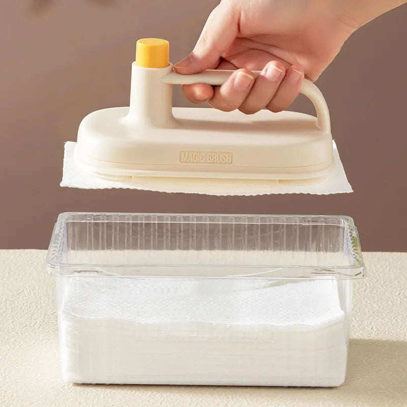 Magic Brush disposable cleaning tool with plastic handle, 50 white non-woven rags, and a storage box holder.