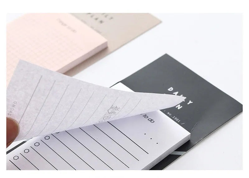 Planning notepad with 50 sheets of 80g paper in pink or red cover, showing 10x6cm page size