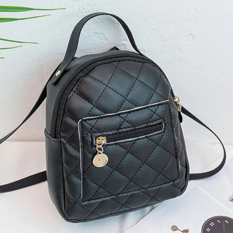 Girls' square hard PU backpack with embroidery, soft handle, in white, black, or pink.