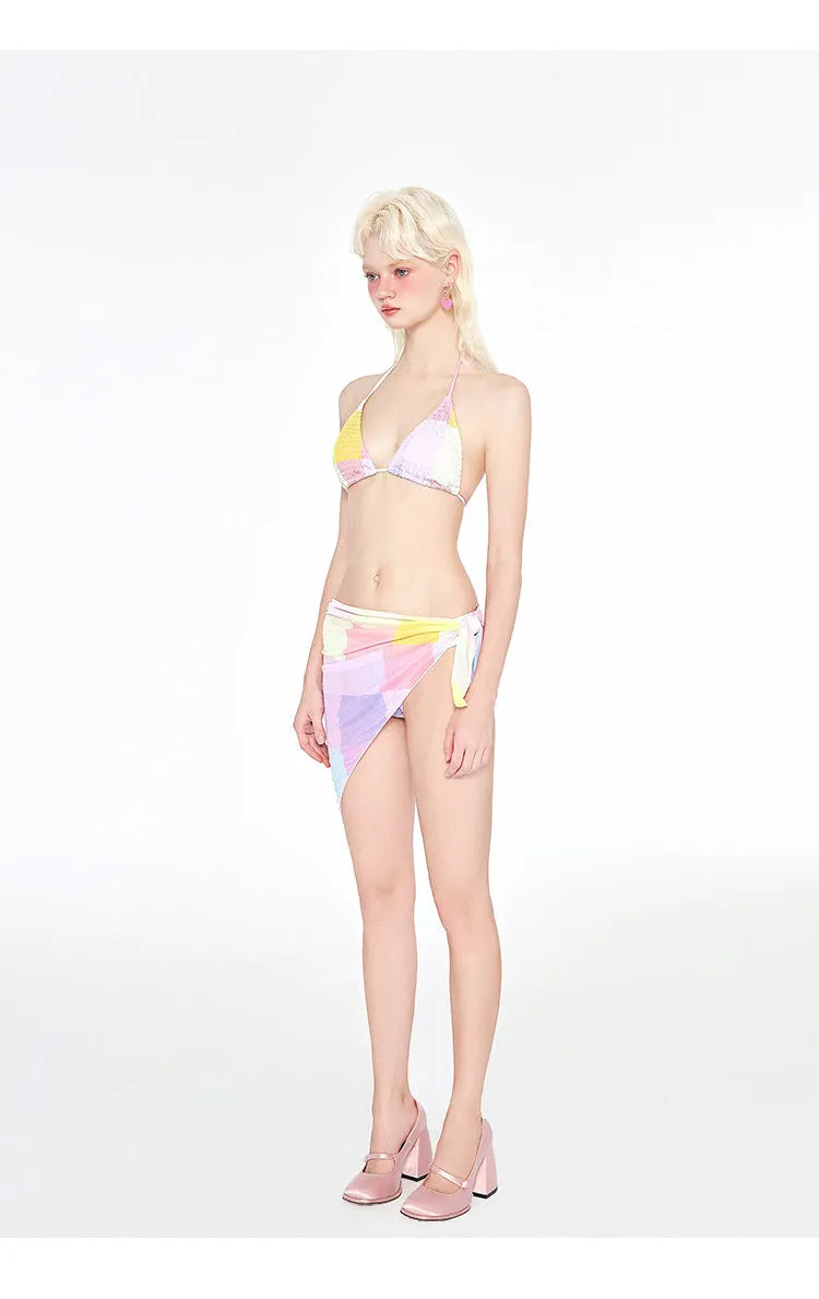 Rainbow Pink triangle bikini top and bottom set on a mannequin