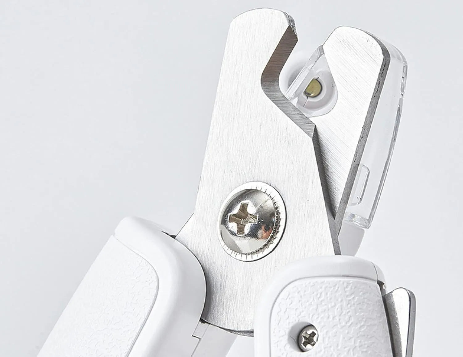 White pet nail clipper with LED light, transparent anti-splash guard, and leather-like handle
