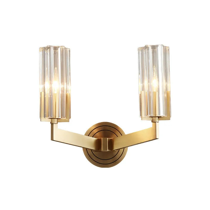 Modern minimalist copper wall lamp with single head on a plain wall.