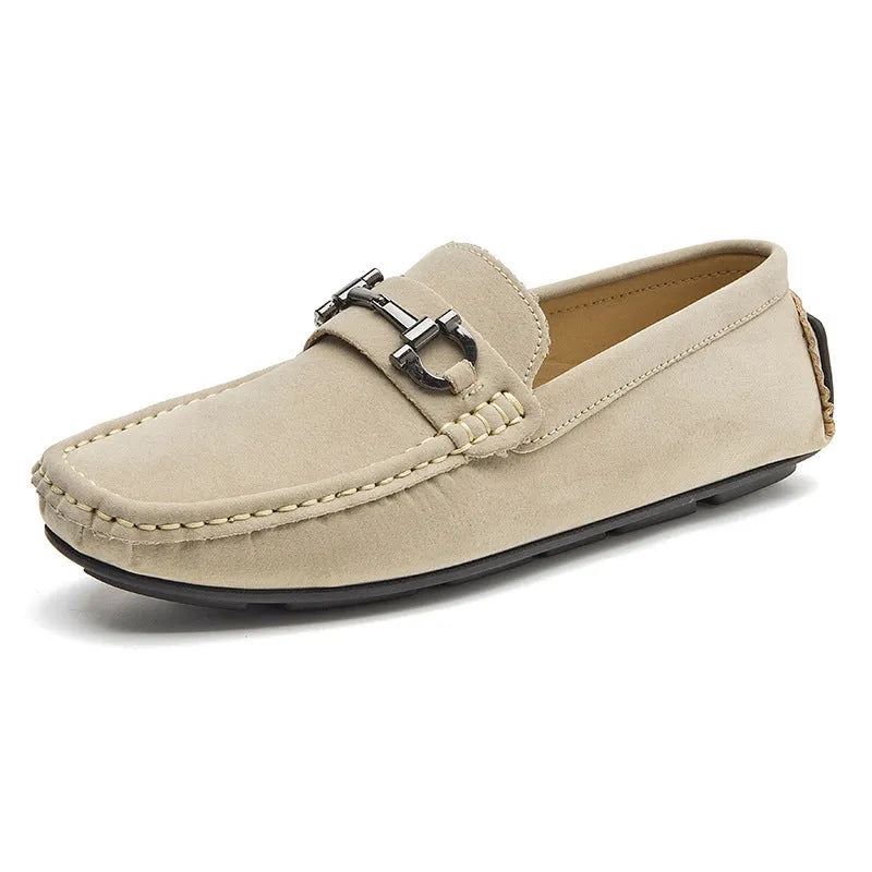 Men's brown leather slip-on loafers with a round toe and rubber sole.