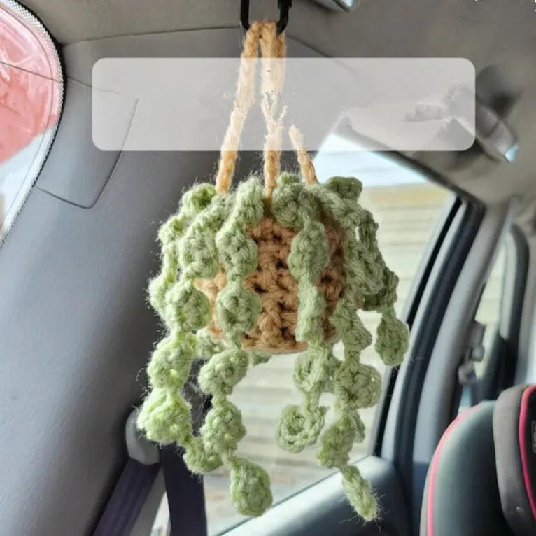 Green and white knitted wool car plant decoration with 8cm base and 25cm hanging rope