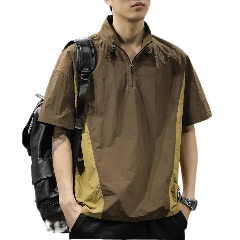 Man wearing a brown half-zip stand collar casual shirt made from ice silk fabric.