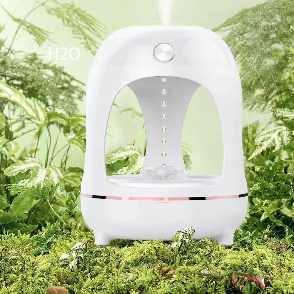 Rose gold and white ultrasonic humidifier with levitating water drop design and LED night light