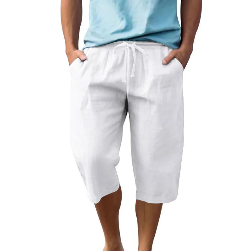 Men's loose fit linen shorts in light blue colour with a high waist and drawstring.