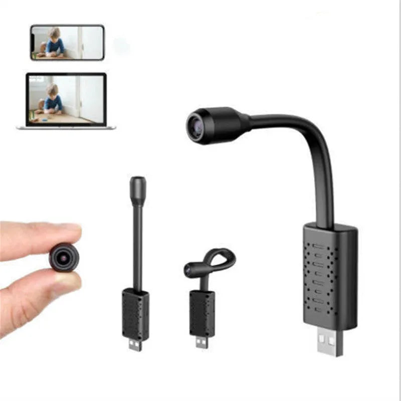 Black V380 wireless USB security camera showing compact size and microSD card slot.