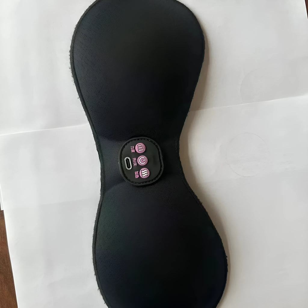 Black adhesive electric chest massage pads with three-key English control unit for hands-free vibration massage.
