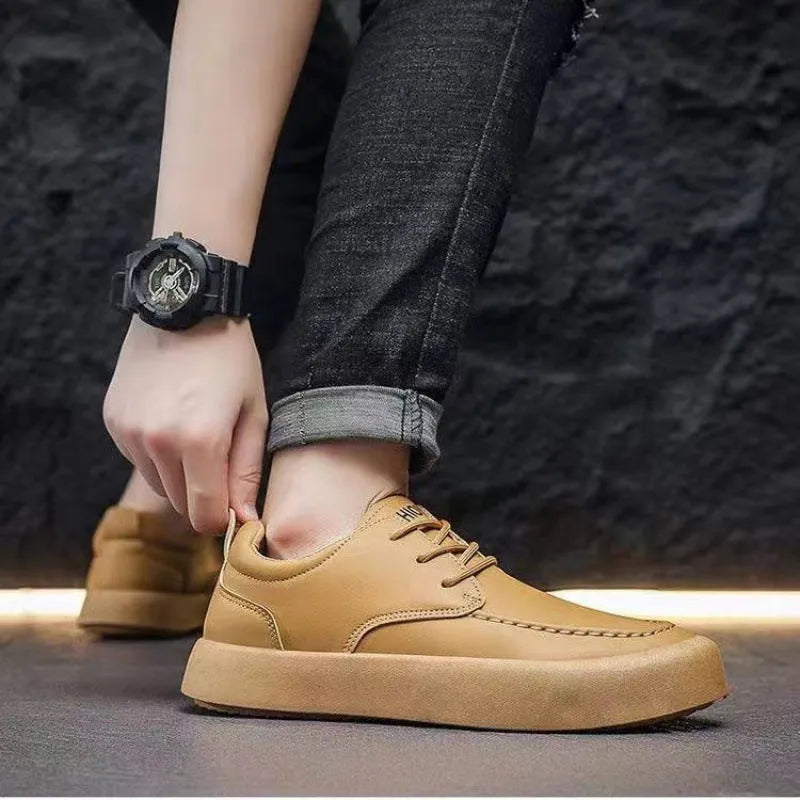 Men's brown casual lace-up shoes with round toe and flat platform sole on a white background.