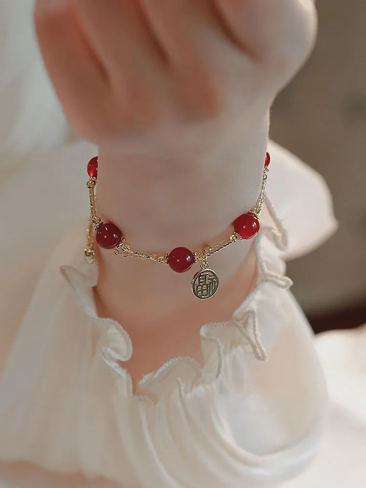 Women's double-layer alloy bracelet with a red agate blessing card charm and horse motif