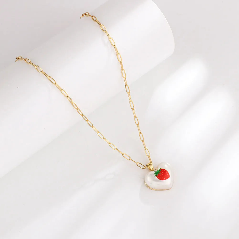 Adjustable geometric chain necklace with a choice of strawberry, pineapple, apple, pear or cherry fruit charm pendant.
