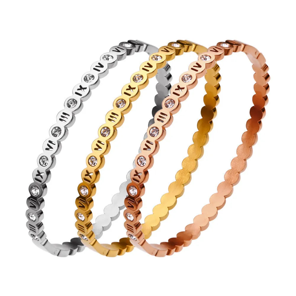 Korean style titanium steel bracelet showing gold rose gold and steel colour options with number decoration