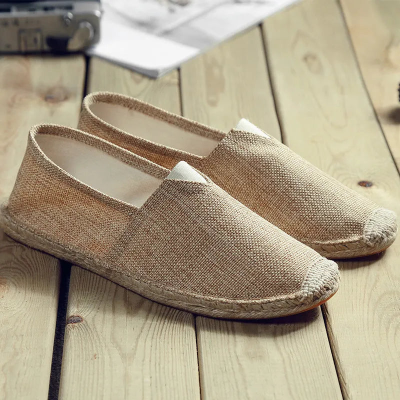 Men's solid colour canvas casual shoes with round toe in multiple size options.