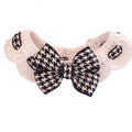 Knitted woollen pet collar with houndstooth pattern in red or black, shown in four sizes from 20cm to 35cm.