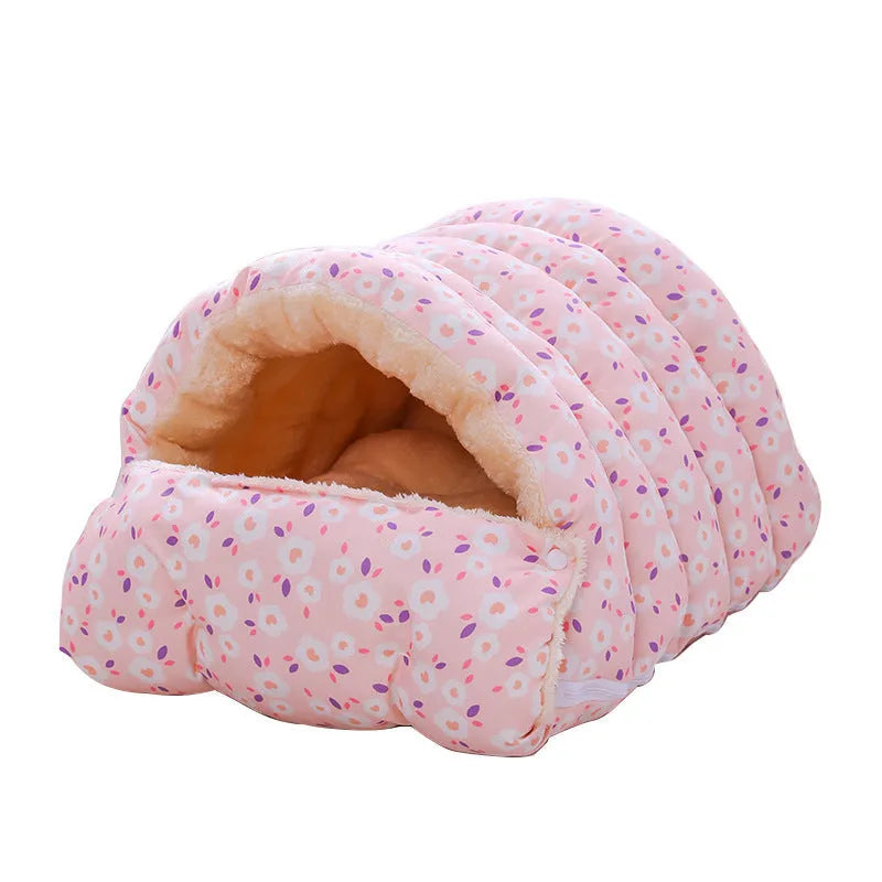Enclosed winter cat bed with a removable cover in a floral pattern, shown in small and medium sizes.