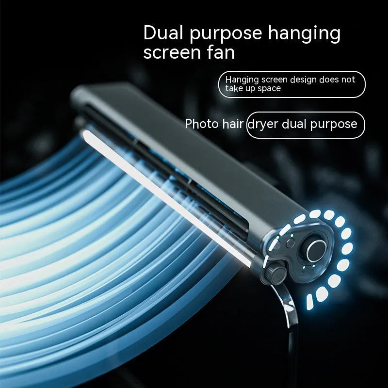 Black USB-powered bladeless clip-on fan with integrated lighting lamp attached to a laptop screen.