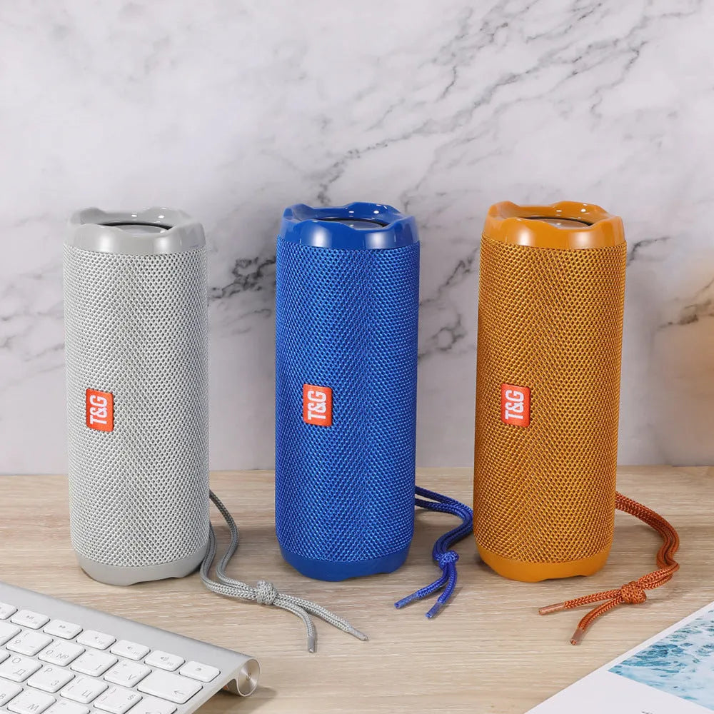 Fabric portable Bluetooth speaker in a choice of colours showing the integrated card holder slot.
