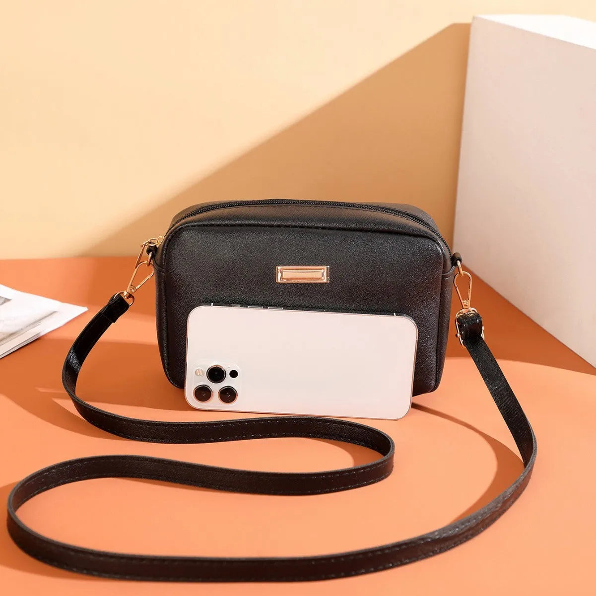 Ladies' PU shoulder bag with three-dimensional pocket in horizontal square design