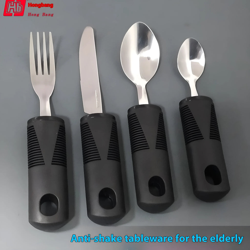 Stainless steel adaptive spoon and fork with black rubber handles for assisted eating.