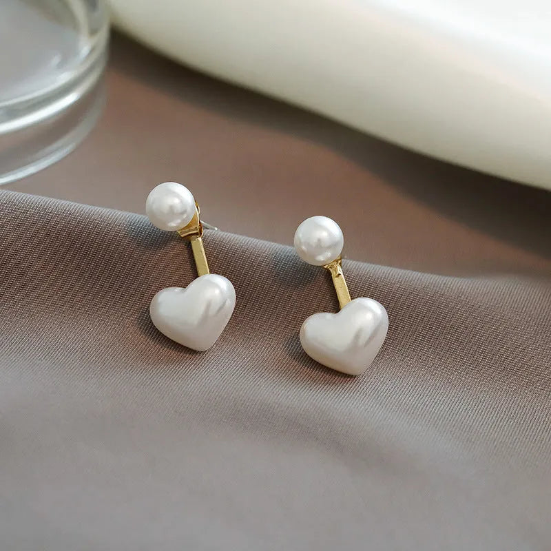 Heart-shaped pearl stud earrings with Korean design, alloy construction, electroplated finish and artificial gem accents