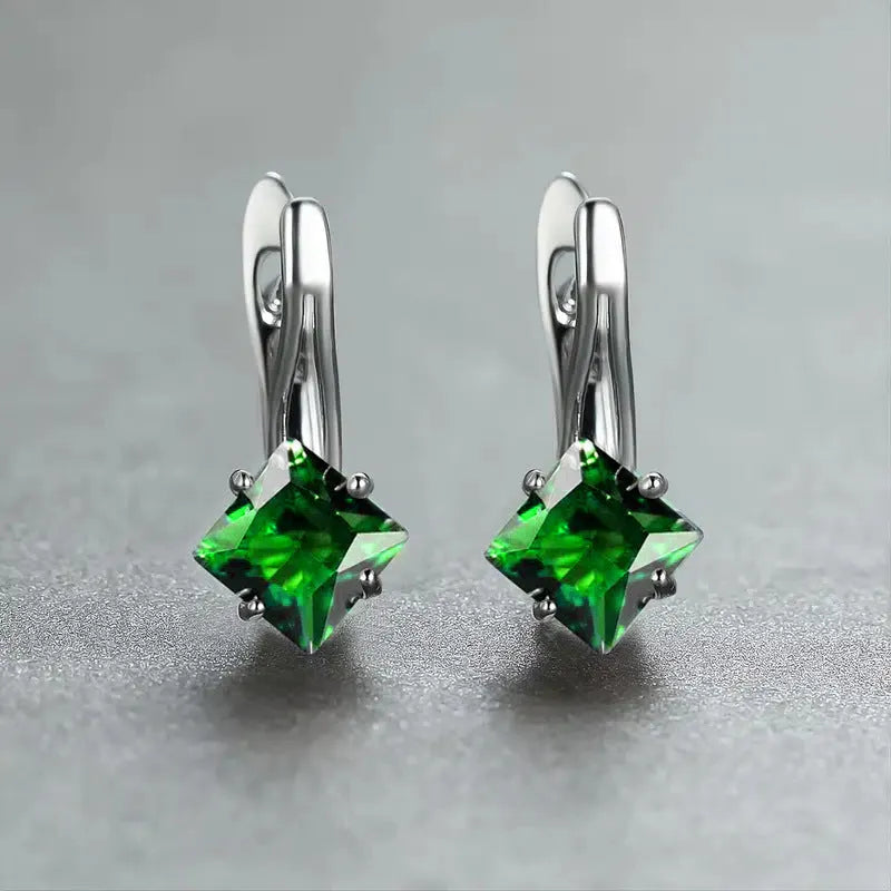 Women's copper diamond design earrings with inlaid zircon detail in blue, green, and colour variations.
