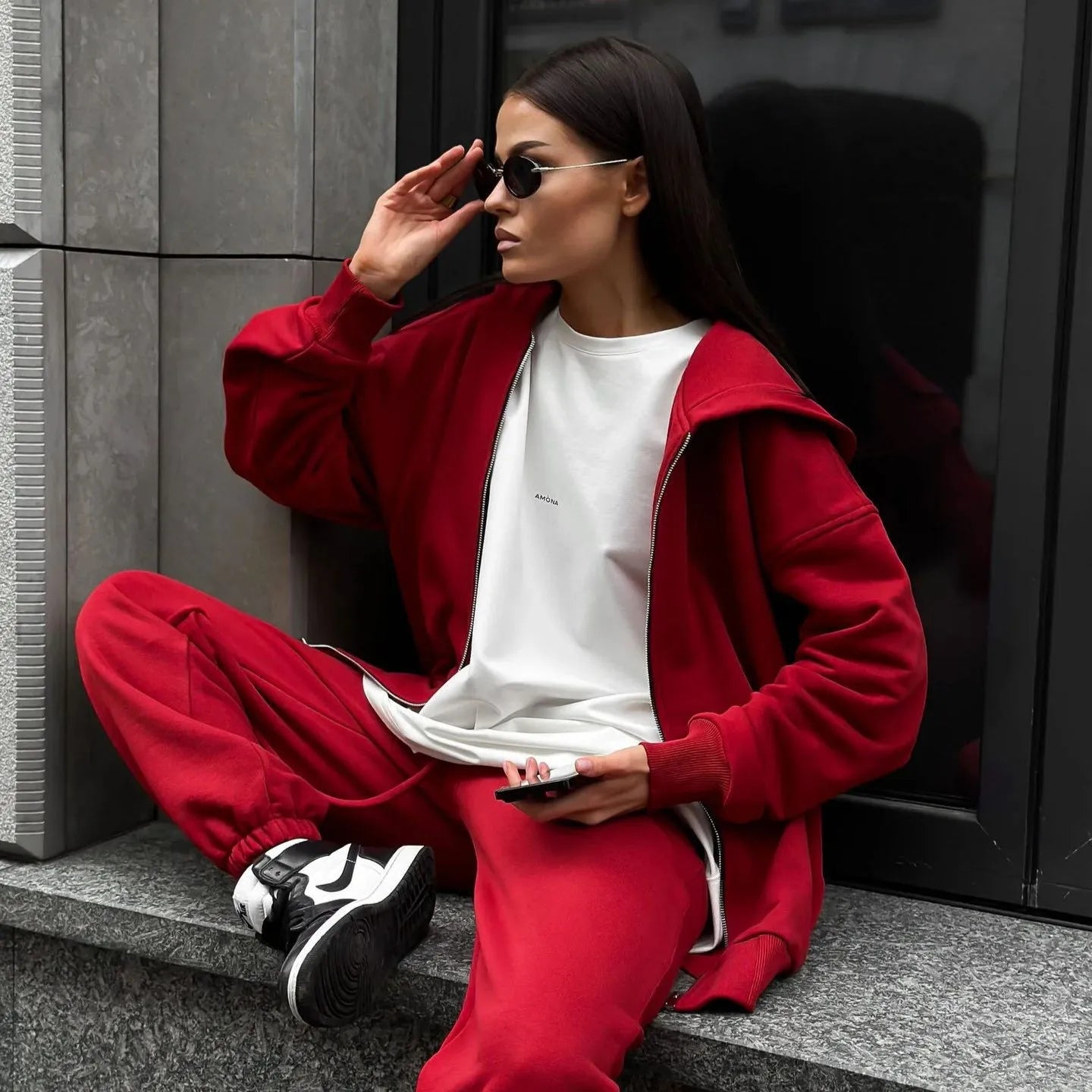 Street style loose fit two-piece set with long-sleeved coat and matching trousers in solid colour