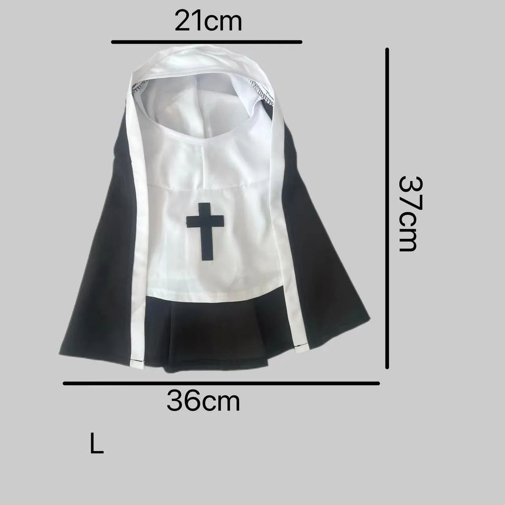Black and white nun cloak costume on a small dog for Halloween.