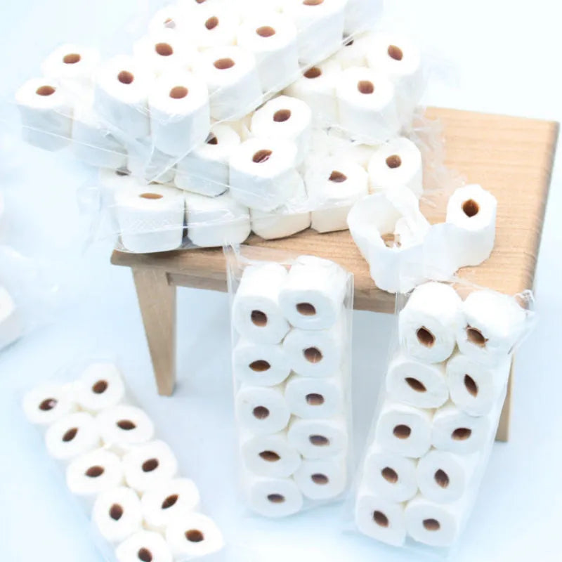 Miniature paper tissue roll model for dollhouse bathrooms measuring 30x15x80mm