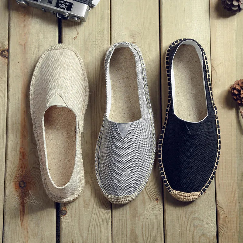 Men's solid colour canvas casual shoes with round toe in multiple size options.