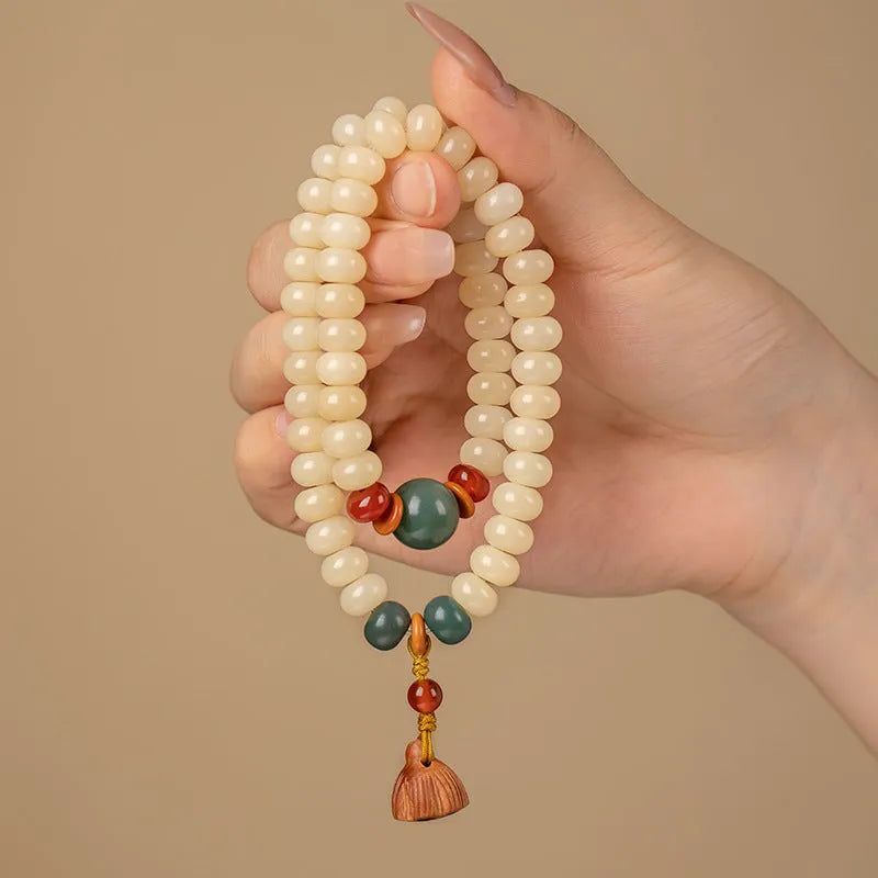Wooden women's bracelet with milk butter bodhi beads in double ring design, beads measure 6x9mm