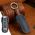 Genuine cowhide leather Porsche key cover with a retro bag buckle in blue and brown colour options.