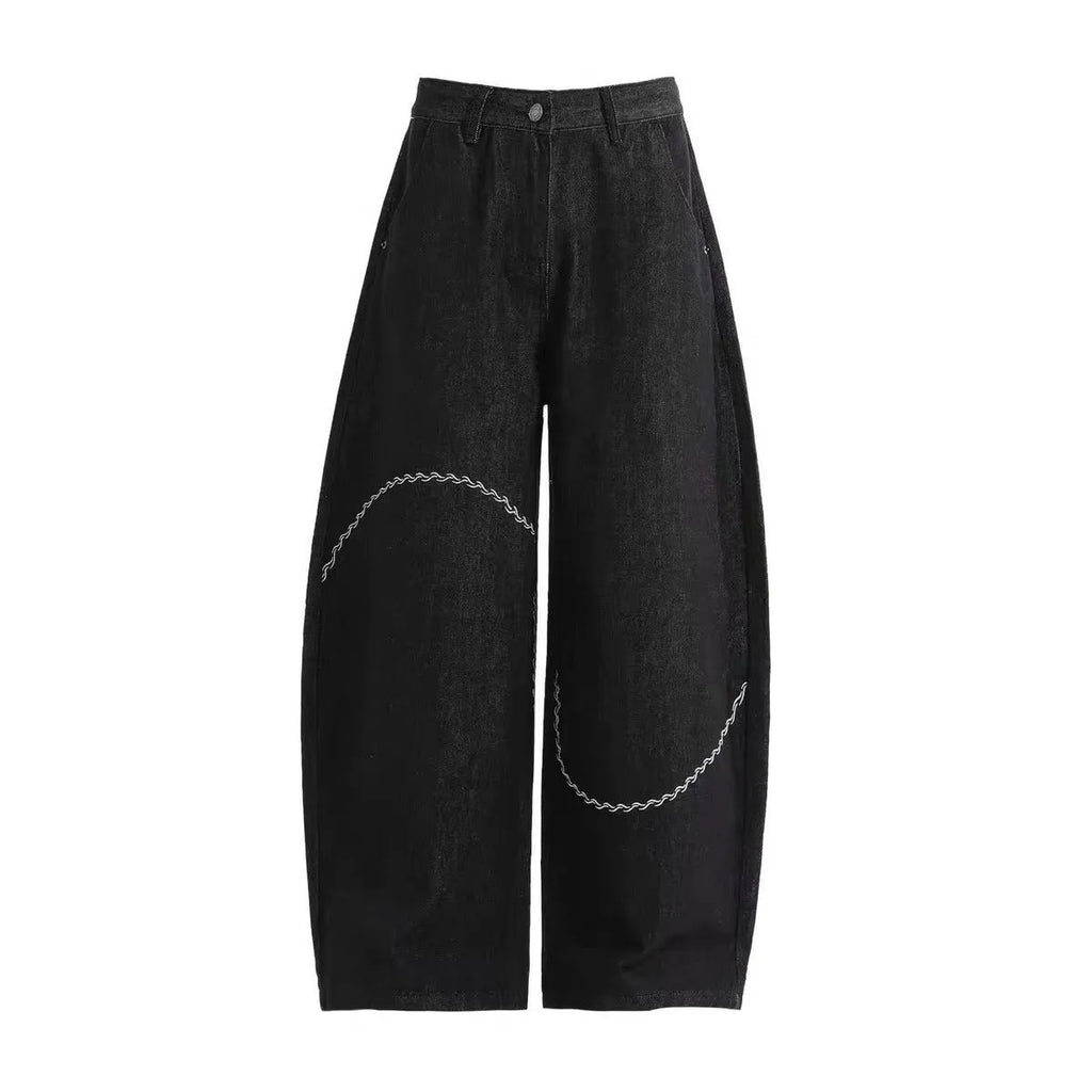 Black straight-leg trousers with zip fly placket and mid-waist design