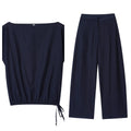 Women's linen-blend co-ord set featuring off-neck blouse with flounced sleeves and wide-leg trousers