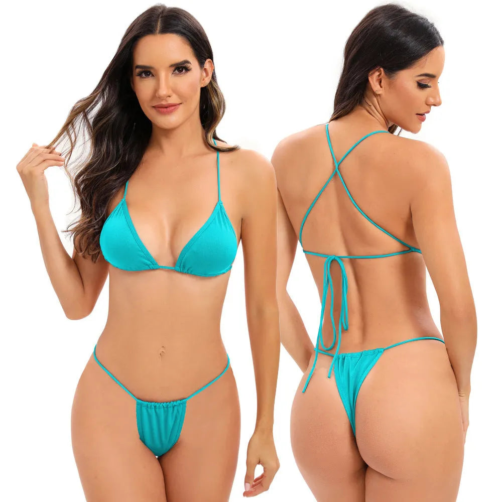 Women's candy coloured cross strap bikini swimsuit on a mannequin, showing the multi-strap design on the briefs.