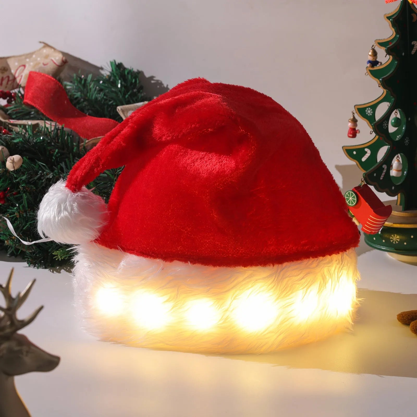 Red and white plush Santa hat with LED lights illuminating in multiple colours