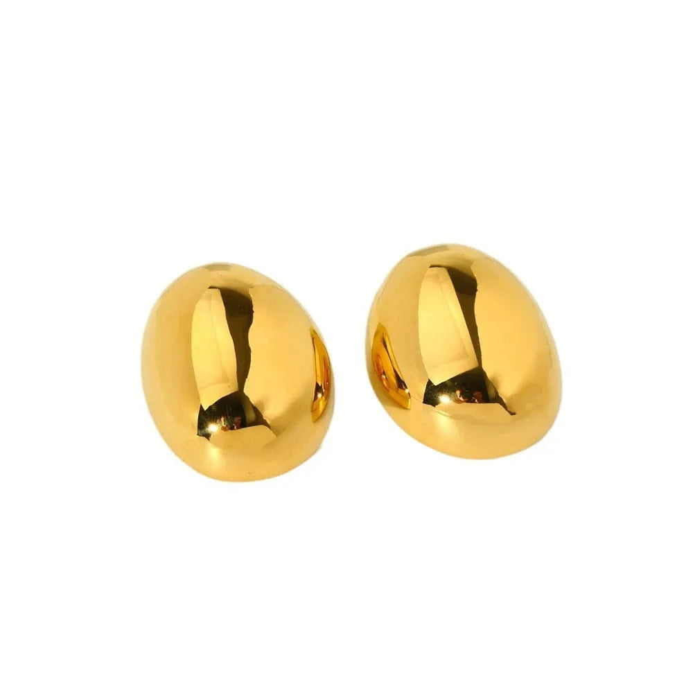 Geometric stainless steel ear studs with exaggerated glazed surface finish in DFE139 colour