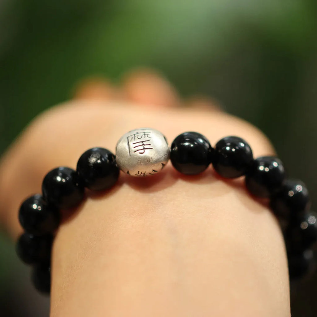 Handmade black agate and sterling silver bracelet with 10mm beads and Chinese style.