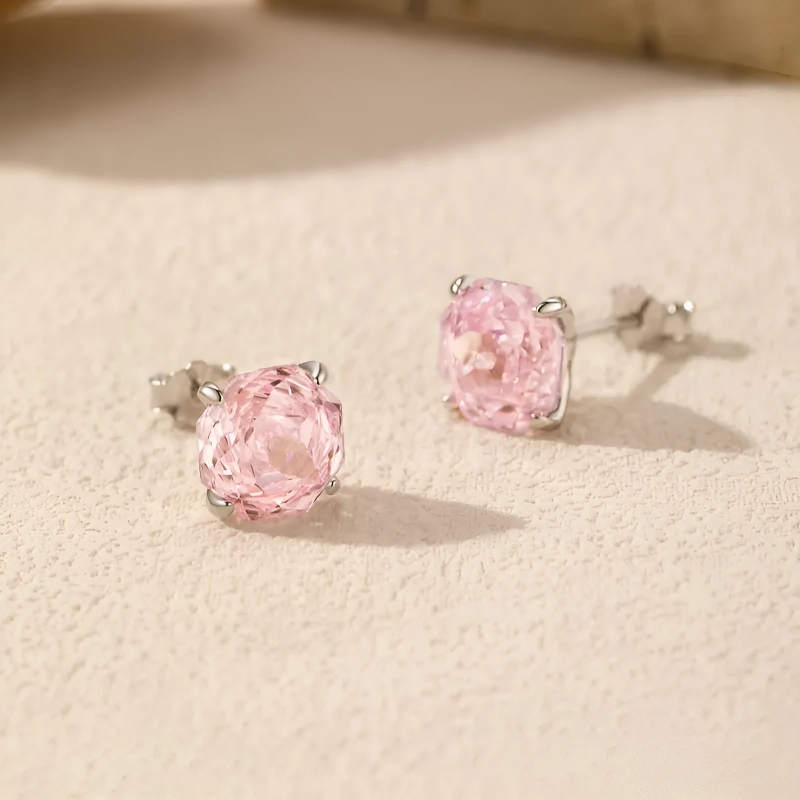 S925 sterling silver rose stud earrings for women in 6mm and 8mm sizes on a white background.