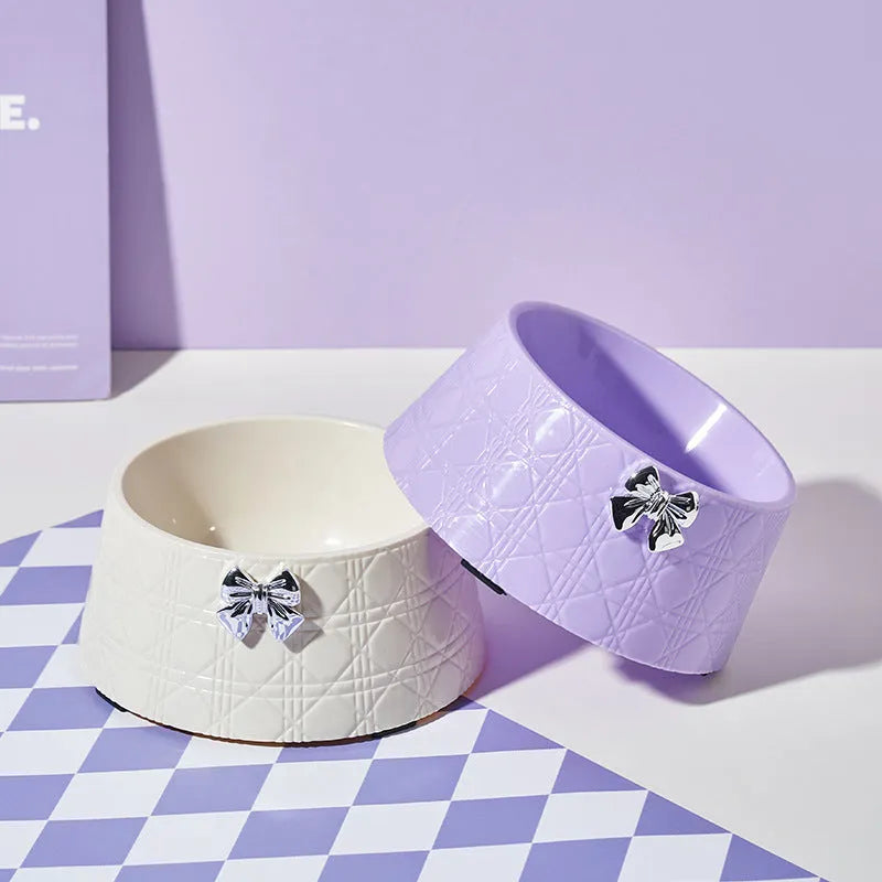 Decorative pet bowl with diamond pattern and bowknot decoration in multiple colour options