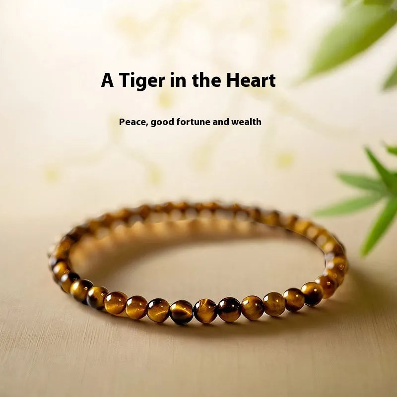Tiger's Eye stone bracelet with geometric design in New Chinese style showing different bead sizes